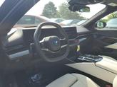 Thumbnail of 2024 Black Sapphire Metallic BMW i5