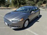 Photo of 2014 Sterling Gray Metallic Ford Fusion Hybrid