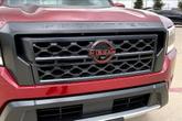 Thumbnail of 2024 Cardinal Red Metallic Nissan Frontier