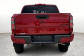 Thumbnail of 2024 Cardinal Red Metallic Nissan Frontier