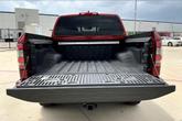 Thumbnail of 2024 Cardinal Red Metallic Nissan Frontier