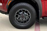 Thumbnail of 2024 Cardinal Red Metallic Nissan Frontier