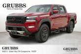 Photo of 2024 Cardinal Red Metallic Nissan Frontier
