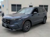 Thumbnail of 2026 Canyon River Blue Metallic Honda CR-V Hybrid