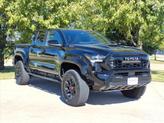 Photo of 2024 Black Toyota Tacoma