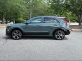 Thumbnail of 2025 Cityscape Green Kia Niro
