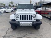 Thumbnail of 2018 Bright White Clearcoat Jeep Wrangler JK Unlimited