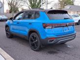 Thumbnail of 2025 Cornflower Blue W/Black Roof Volkswagen Taos