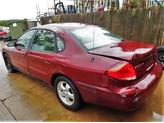 Thumbnail of 2004 Merlot Clearcoat Metallic Ford Taurus