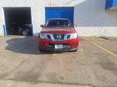 Photo of 2016 Lava Red Nissan Frontier
