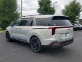 Thumbnail of 2026 Ivory Silver Kia Carnival Hybrid