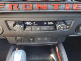 Thumbnail of 2025 Afterburn Orange Nissan Frontier