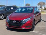 Photo of 2025 Scarlet Ember Tintcoat Nissan Versa