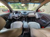 Thumbnail of 2015 Garnet Red Mica Hyundai TUCSON
