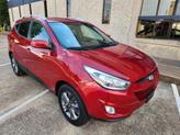 Thumbnail of 2015 Garnet Red Mica Hyundai TUCSON