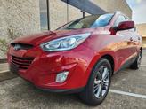 Photo of 2015 Garnet Red Mica Hyundai TUCSON