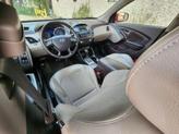 Thumbnail of 2015 Garnet Red Mica Hyundai TUCSON