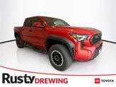 Photo of 2025 Supersonic Red Toyota Tacoma