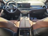Thumbnail of 2025 Carbon Black Metallic BMW X6