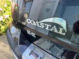Thumbnail of 2024 Deep Black Pearl Volkswagen Taos