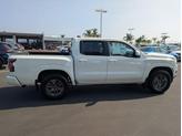 Thumbnail of 2025 Glacier White Nissan Frontier