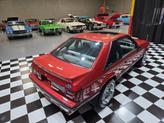 Thumbnail of 1990 Red Ford Mustang