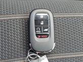 Thumbnail of 2025 Radiant Red Metallic Honda CR-V Hybrid