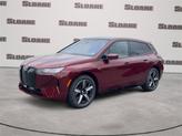 Photo of 2026 Aventurin Red Metallic BMW iX