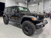 Thumbnail of 2025 Black Clearcoat Jeep Wrangler