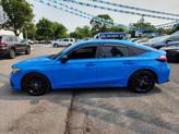 Thumbnail of 2024 Boost Blue Pearl Honda Civic