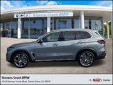 Photo of 2026 Skyscraper Grey Metallic BMW X5 PHEV