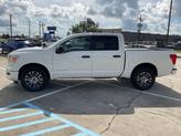 Thumbnail of 2023 Glacier White Nissan Titan