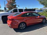 Thumbnail of 2022 Fire Orange Kia Forte