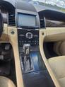 Thumbnail of 2013 Deep Impact Blue Metallic Ford Taurus