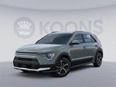 Photo of 2025 Cityscape Green Kia Niro