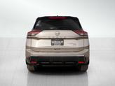 Thumbnail of 2025 Champagne Silver Metallic/Super Black Nissan Rogue