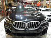 Thumbnail of 2021 Carbon Black Metallic BMW X6