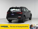Thumbnail of 2023 Black Volkswagen Taos