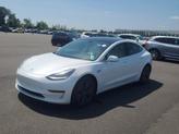 Thumbnail of 2020 White Tesla Model 3