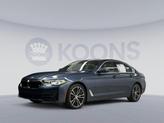 Photo of 2023 Arctic Race Blue Metallic BMW 530