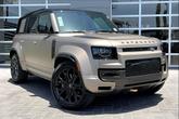 Thumbnail of 2025 Petra Copper Premium Metallic Land Rover Defender