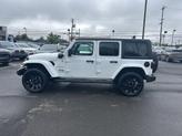 Thumbnail of 2022 Bright White Clearcoat Jeep Wrangler Unlimited 4xe