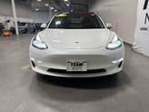 Photo of 2021 Pearl White Multi Tesla Model 3