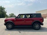 Thumbnail of 2025 Ruby Red Metallic Tinted Clearcoat Ford Bronco