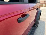 Thumbnail of 2025 Ruby Red Metallic Tinted Clearcoat Ford Bronco