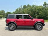 Thumbnail of 2025 Ruby Red Metallic Tinted Clearcoat Ford Bronco