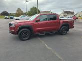 Thumbnail of 2023 Cardinal Red Metallic Tricoat Nissan Frontier