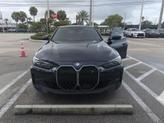 Thumbnail of 2023 Tanzanite Blue II Metallic BMW i4 Gran Coupe