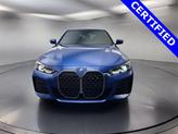 Thumbnail of 2022 Portimao Blue Metallic BMW i4 Gran Coupe