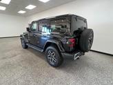 Thumbnail of 2024 Black Clearcoat Jeep Wrangler